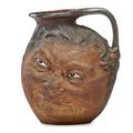 Robert w martin 1843  1923 martin brothers large glazed stoneware doublesided face jug england 1911 signed rw martin  bros london  southall 451911 68 9 x 7 12 provenance rago