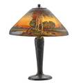 Handel table lamp with tree trunk base and woodlands scenic shade meriden ct ca 1910 reversepainted and acidetched glass patinated metal three sockets shade signed handel 6939 and stamped