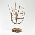 Jean woodman b 1924 abstract tabletop sculpture westport ct mixed metals mounted on wood unmarked 22 12 x 14 14 dia