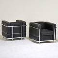 After le corbusier pair of lc2 style chairs 1990s chromed steel leather unmarked 26 12 x 30 x 28