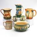 Roseville holland pitcher chamberpot and two mugs together with three early pitchers zanesville oh ca 1915 all unmarked tallest 9 12