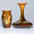 Anne marie valentien 1862  1947 rookwood two standard glaze vases one decorated with violets and one with roses cincinnati oh 189194 both marked taller 7 12