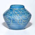 Julia mattson north dakota school of mines glazed ceramic vase incised with oak leaf decoration grand forks nd indigo stamp and incised artists cipher 6 14 x 6 12 dia