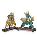 Two chinese roof tiles musicians astride a bull together with a man with outstretched arms surmounting a foo dog 19th20th c larger 14 12 x 13 x 4 34