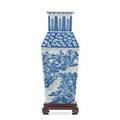 Chinese blue and white porcelain vase asian scenes with floral accents tapered sides on wooden base early 20th c 17