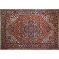 Heriz oriental rug geometric design on red ground mid 20th c 128 x 87