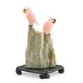 Style of peter muller carved rose quartz parrot on crystal base 20th c unmarked 1 12 x 6 x 2 12
