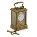 Miniature carriage clock time only brass with beveled glass and repousse work france ca 1900 3 12 x 2 x 1 58