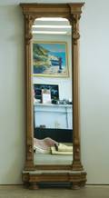 A Gilt Standing Wall Mirror with Marble Base