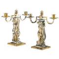 After andre deluol pair of two light candelabra silver plated each with nude female figure raised on a step square base 13 h early 20th c provenance estate of a private collector new york