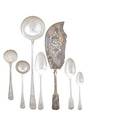English sterling utensils twentyfour pieces with various crest monograms including spoons ladles a fish server spoons with shell bowls a skewer by makers chawner amp co george smith iii w
