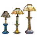 Tiffany studios three favrile candlestick lamps two gold one blue new york 1900s glass silver brass single socket all glass bases and shades marked tallest 16 x 7