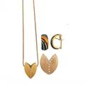 Contemporary enameled or gemset yellow gold jewelry