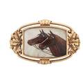 Reverse carved crystal intaglio equestrian brooch