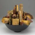 Hap sakwa sculpture of assorted turned wood elements within ebonized bowl signed hap sakwa 984 14 x 18 x 16