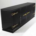 Tommi parzinger credenza in black lacquered finish with brass strap hinges and four doors enclosing shelves and divided drawers 34 x 96 x 21