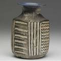 Marguerite wildenhain  pond farm ceramic vase with flared rim and impressed patterns which reference bauhaus tile decoration covered in matte brown glaze with lapis blue interior signed pond farm