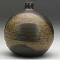 Toshiko takaezu stoneware bottle with fluted rim covered in mottled brown glazes signed tt 7 x 6 x 5 12