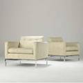 Florence knoll  knoll pair of club chairs upholstered in cream woven fabric on polished steel bases accompanied by custom cream fabric slipcovers not shown 30 x 32 x 32