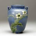 Roseville experimental thimbleweed vase crisply carved with white blossoms on a blue ground incised on body thimbleweedtall anemonewhite petalsgreen centresgreen buds minor chips to base