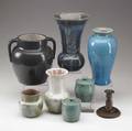 Pisgah forest etc nine items seven pisgah forest vases and covered jars together with a vase and single candlestick by other maker all marked