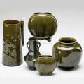Chelsea keramic art works five vessels the tallest a pitcher with birds and grasses grinding chips to base of faceted vase small reglued chip to scrolled foot and hairline to rim of pilgrim flask