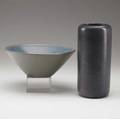 Marblehead two vessels tall cylindrical vase in unusual deep purple glaze and flaring gray and blue bowl hairline both have ship stamp 8 34 ea
