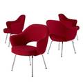 Eero saarinen  knoll set of four armchairs upholstered in red wool on chromeplated steel legs all with knoll upholstery labels 31 34 x 26 12 x 18 12