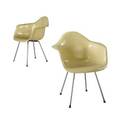 Charles and ray eames  herman miller pair of fiberglass shell chairs in pale yellow one has herman miller paper label 31 14 x 24 12 x 19 12