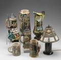 Pottery and glass lot eight pieces include five steins two pitchers and a panel glass boudoir lamp tallest 12 12