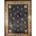 Chinese rug with black background and gold border 20th c with wear 175 x 144