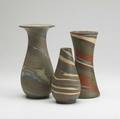 Niloak three missionware vases of marbleized clay each marked with stamp or paper label tallest 9