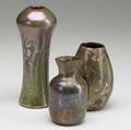 Sicard  clement massier three pieces corseted vase marked weller and two massier cabinet vases weller 6