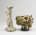 Amphora two vases one with applied poppies and buttressed base the other with a languid maiden picking cherries minor losses to poppy leaves and petals restoration to head and spout red teplitz st