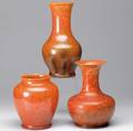 Pilkington  royal lancastrian three vases in mottled yelloworange glaze all stamped royal lancastrian england tallest 10 12