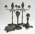 Buffalo art crafts shop etc two enameled triangular candlesticks and a box two marked together with a pair of hammered wrought iron candlesticks with owl finials marked for the jones iron works