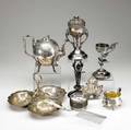 Silverplate 21 pieces 19th20th c two epergnes epergne stand teapot lighter ashtray coasters porcelainhandled cake comb and fruit knives