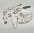 American and foreign silver serving pieces twentytwo pieces includes eleven silver iced tea sipperspoons george iii pierced silver tongs watson silver tea strainer web hollowhandled cheese knife