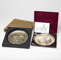 Two salvador dali sterling plates annual commemorative plates for 1971 and 1972 one depicting dionysus and pallas athena 1972 lincoln mint sealed the other dionysus 1971 lincoln mint sealed both