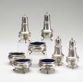 Poole sterling salt cellars with cobalt liners and pepperettes on three lionmask feet 139 ot