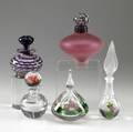 Art glass perfumes group of five all with floral or cane decoration one by trabucco most signed tallest 7