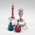 Blown glass perfumes group of five includes blue iridescent by lundberg studios egyptian cranberry cut to clear and iridescent with ornate stoppers some signed tallest 6