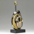 Modern patinated metal abstract lamp base on black enameled base stamped mark overall 20 x 8 x 5 12