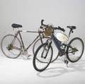 Estate of phillip lloyd powell two bicycles dawes super galaxy touring bike and pacific cycles mountain bike together with a zefal tire pump and his bike helmet dawes 53 x 57 x 59 x 64