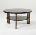 Dominique attr art deco twotier coffee table in mahogany and black lacquer 20 x 36 dia