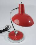 A Small Red Desk Lamp