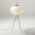 Isamu noguchi akari floor lamp with white paper shade on black enameled steel base with canewrapped handle stamped mark to shade 49 x 20
