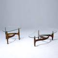 Style of kagan freeform coffee table together with a matching side table each with walnut frame and glass top coffee table 15 x 51 12 x 31