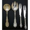 Gorham mythologique and versailles silver flatware patterns designed by antoine heller ca 1888 mythologique 8 12 pierced cold meat fork and 7 12 gravy laddle depict vulcan presenting thunderbol