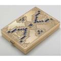 Art deco gemset gold vanity case by ostertag paris engineturned 18k gold with calibre cut blue natural sapphires in the geometric chinese style conforming decoration on reverse sapphire pushpin